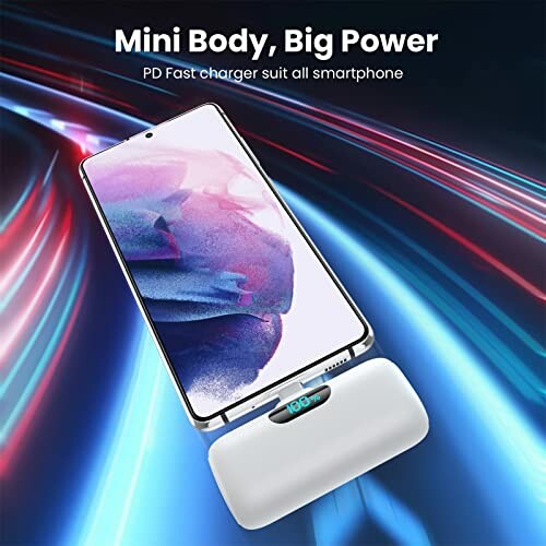 Smartphone on fast charger with dynamic light background.