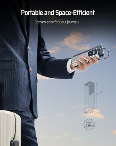 Person holding a compact portable device, suitable for travel.