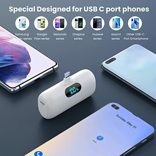 Portable USB-C battery pack with smartphones around it.